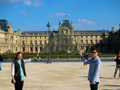 Teddy and Katie Holding the Louvre Pyramid by Sara Obletz